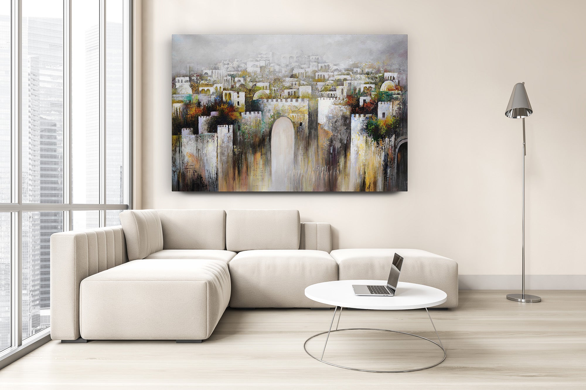 Givaat Halevona - Jerusalem Landscape by Yossi Biton, a captivating painting depicting the serene beauty of Jerusalem, is displayed above a modern white couch in a living room.