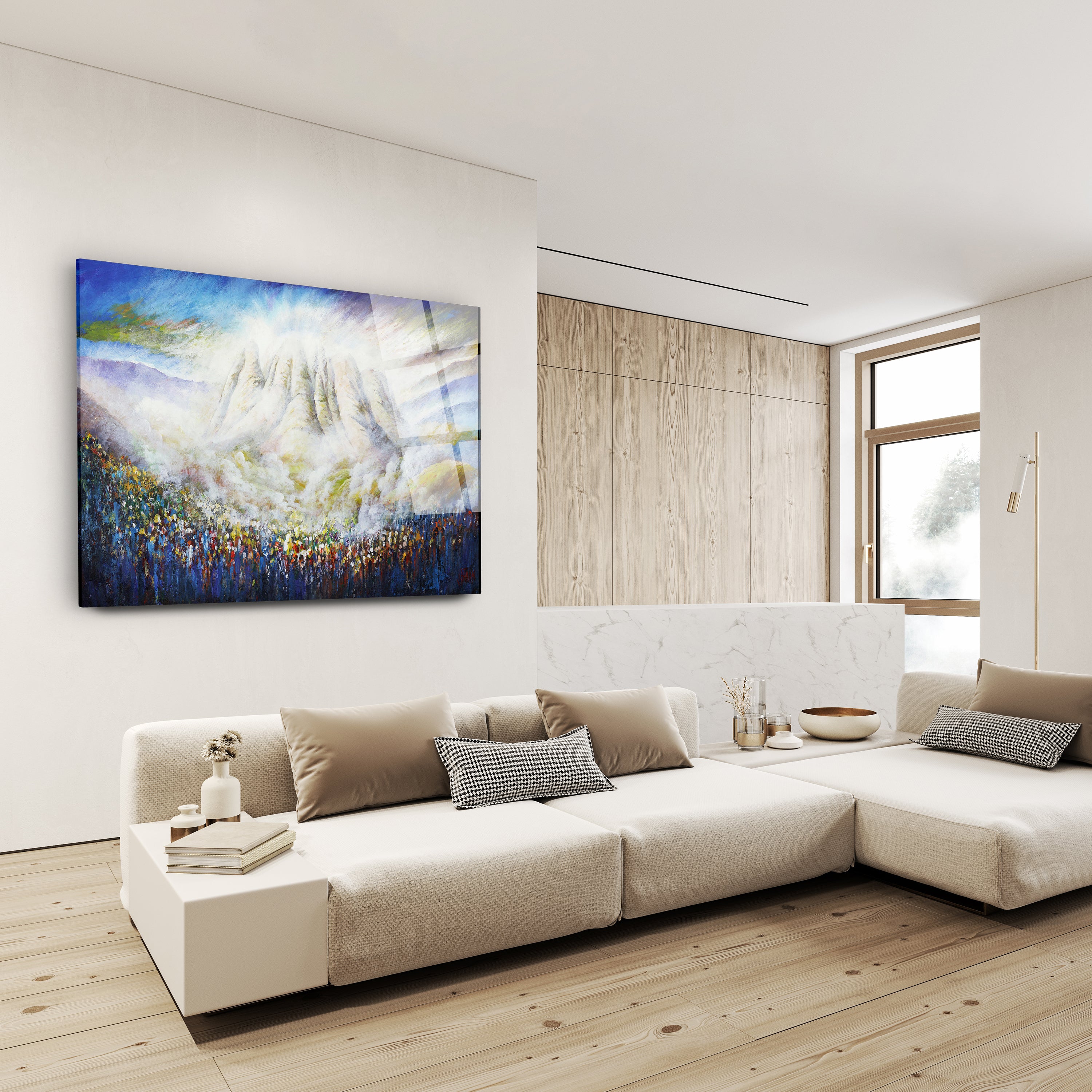 Matan Torah - Mount Sinai Torah Giving by Yossi Bitton, a modern Jewish art print depicting the Giving of the Torah, displayed above a large white couch.