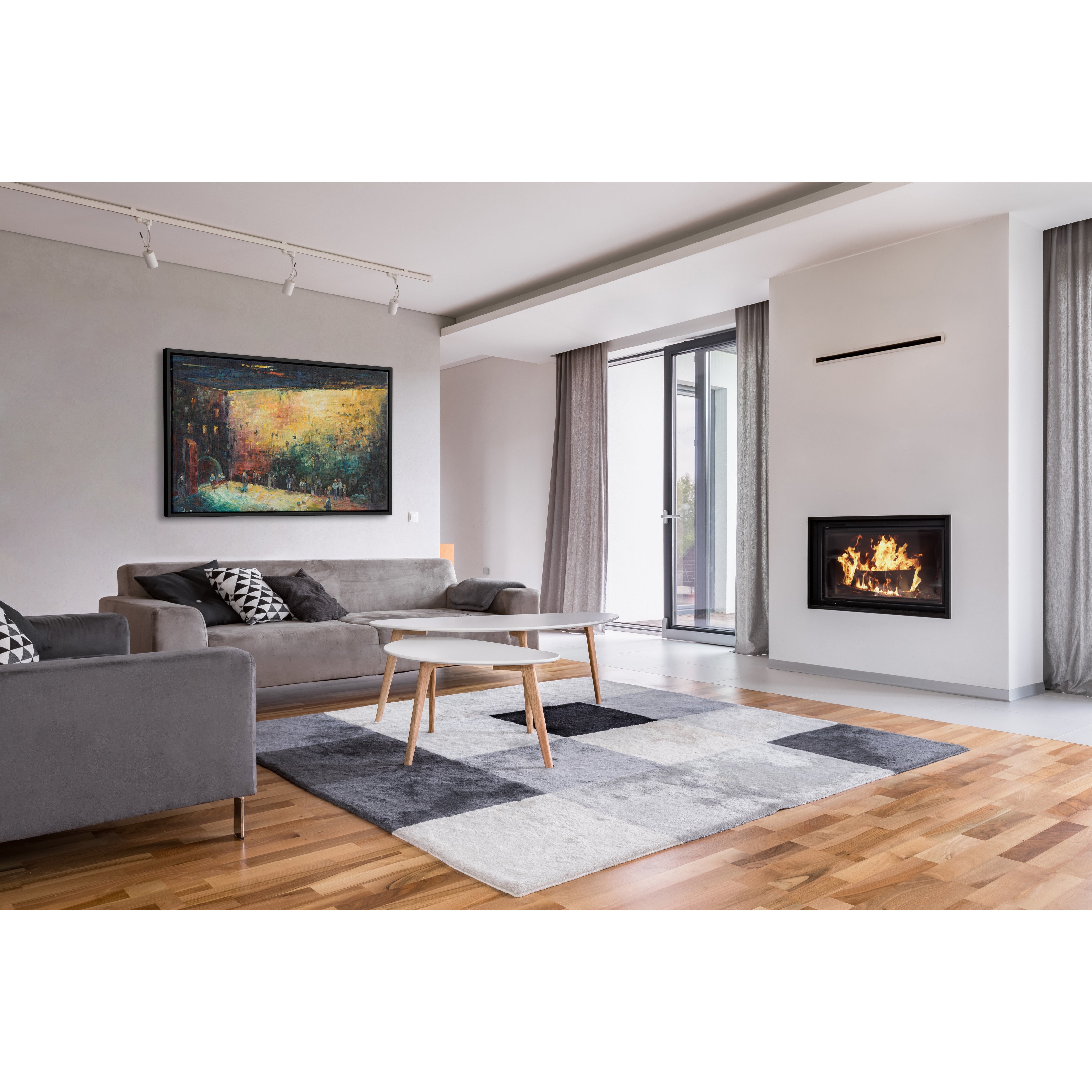 Black & Gold Western Wall Abstract - 51x24 Judaica Art Canvas displayed above a modern living room couch near a fireplace, enhancing the space with its bold design.