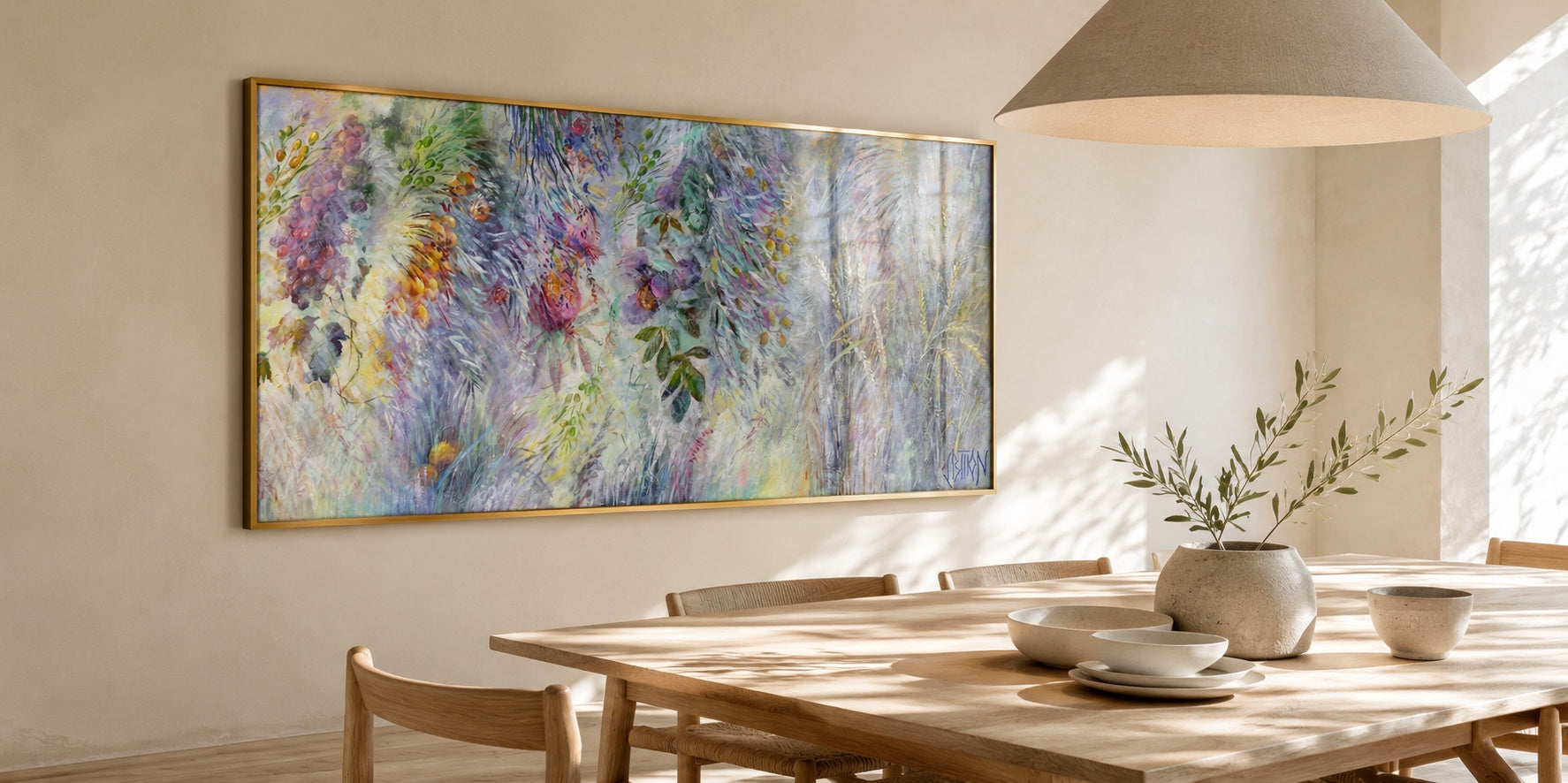 Impressionistic biblical garden painting in lavender, rose, and green tones, brass floater frame above a wooden dining table in a bright minimalist living room.
